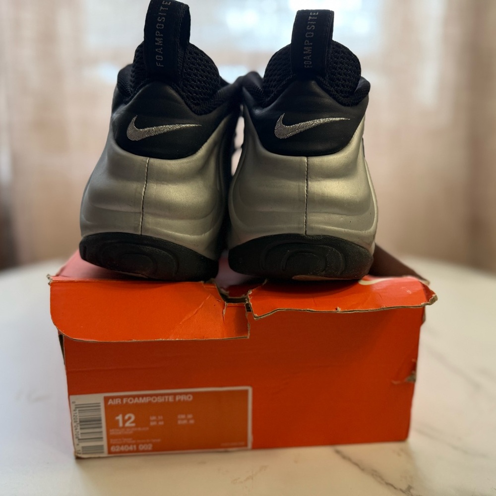 Nike Silver and Black Foamposite Sneakers